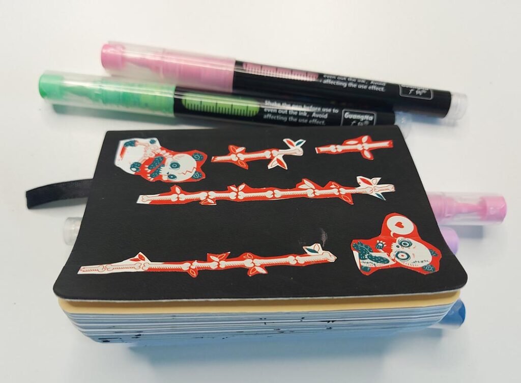 Sketchbook and markers